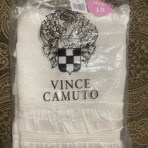 Spaghetti strap dress.  Perfect for a white party or as a summer dress.